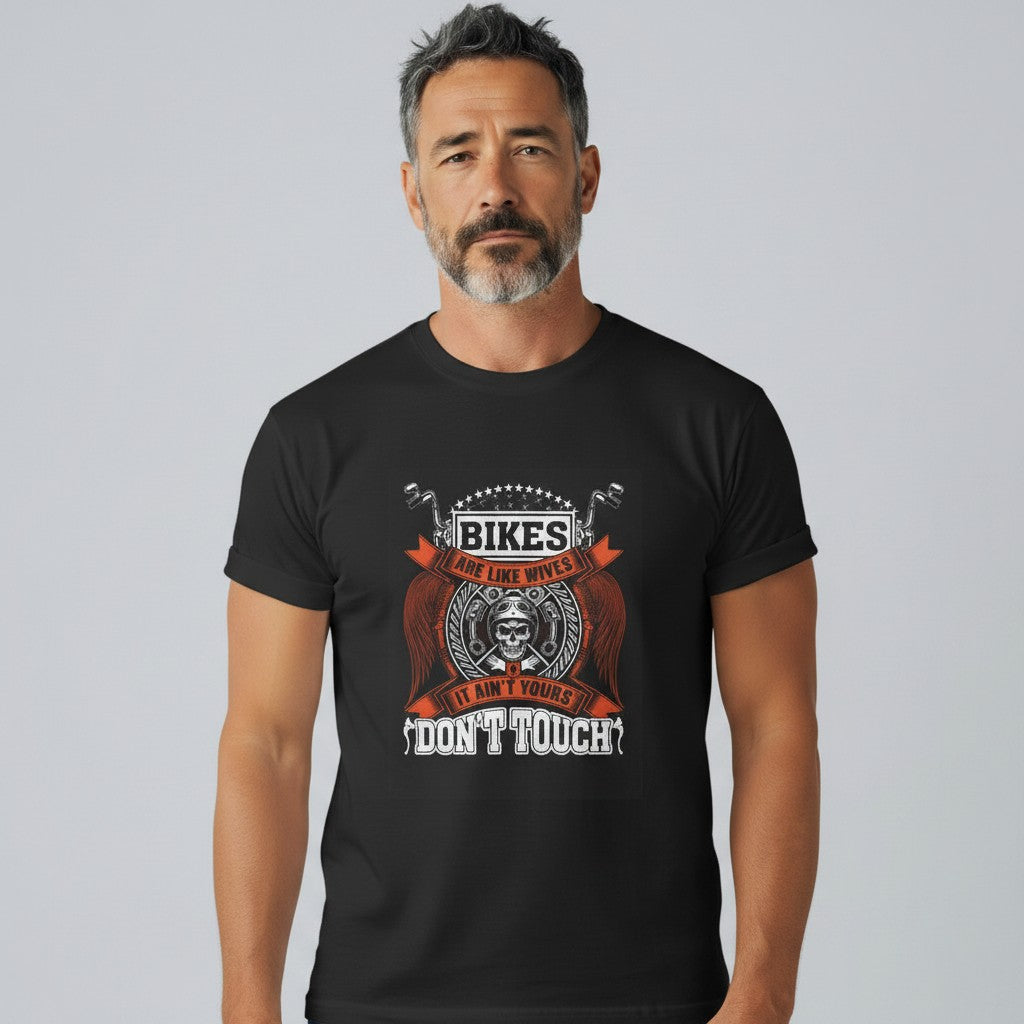 Purple Expressions black 100% cotton biker tee with "Bikes Are Like Wives - It Ain't Yours Don't Touch" graphic.