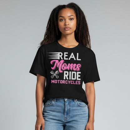 Purple Expressions black t-shirt with pink and white text that says "REAL Moms RIDE MOTORCYCLES" with motorcycle piston graphics.